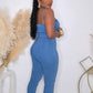 UP CLOSE, NEVER PERSONAL DENIM JUMPSUIT